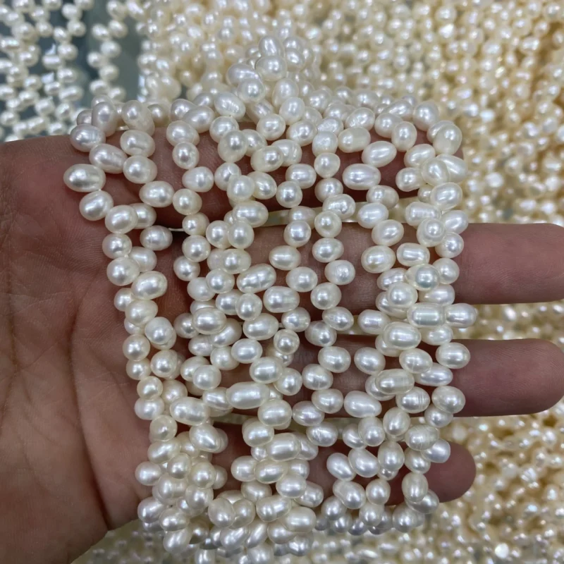2A Wholesale Price High Quality Creative 5-10mm Natural Fresh Water Special Hole Rice Shaped Pearls Strand - Image 3